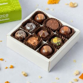a small box of 9 handcrafted chocolates by chococo that are all vegan friendly 