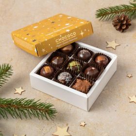vegan festive giftbag hamper by Chococo with an array of handcrafted chocolates, dark chocolate selection of caramel stars, mackerel fish, robin bars and slabs 