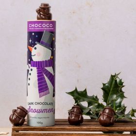 dark chocolate snowmen shapes by Chococo surrounded by holly 