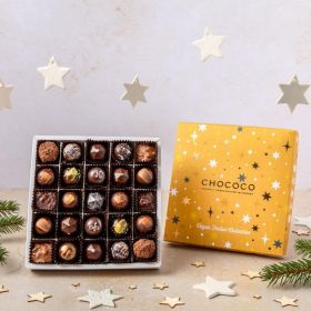 a box of 25 vegan handcrafted dark festive Christmas chocolates by Chococo with handing stars around the gold foiled starry box lid
