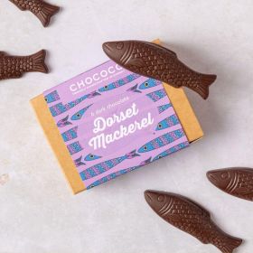 Dorset Mackerel fish shapes made from dark chocolate by Chococo proudly hand craft on top of box 