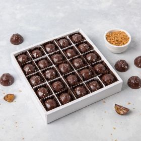 A close up of 25 Dorset Sea Salted Caramel chocolates in a box 