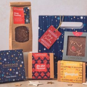 A festive giftbag hamper by chococo with an array of milk chocolate and gold chocolates 