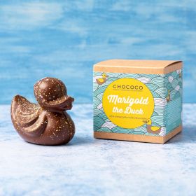 Marigold milk chocolate Chococo duck with yellow & white natural colour painted speckles. Handmade in Dorset in Plastic-free packaging