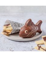 A novelty chocolate fish & chips made from milk & white chocolate by Chococo with newspaper place mat  