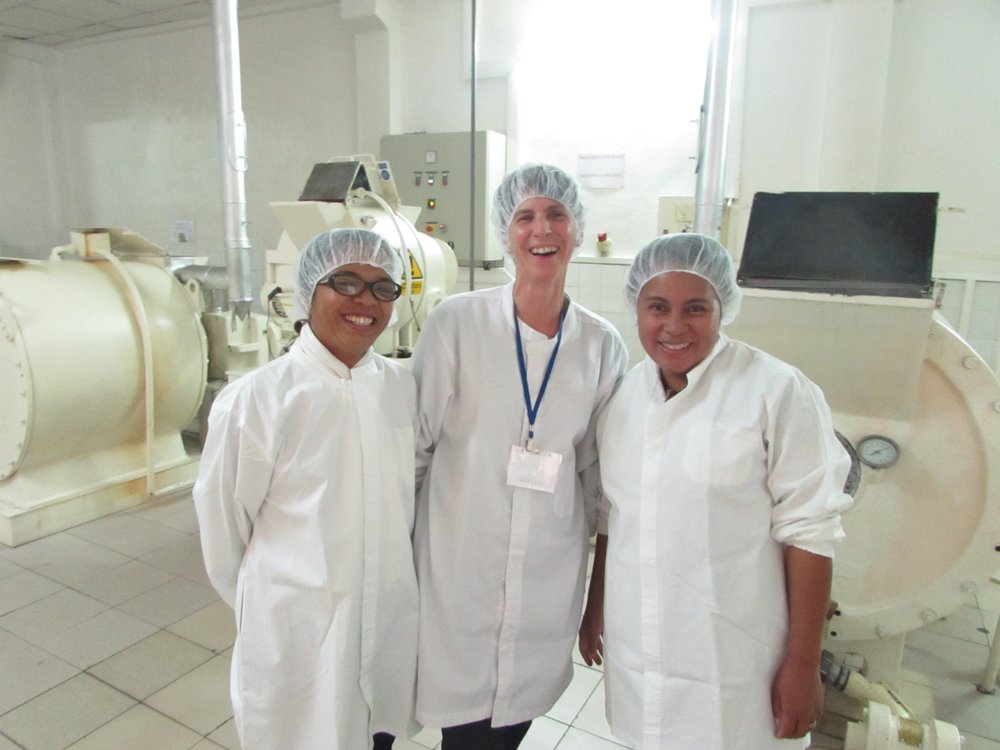 Chococo Claire with staff at Robert chocolate factory Madsagascar