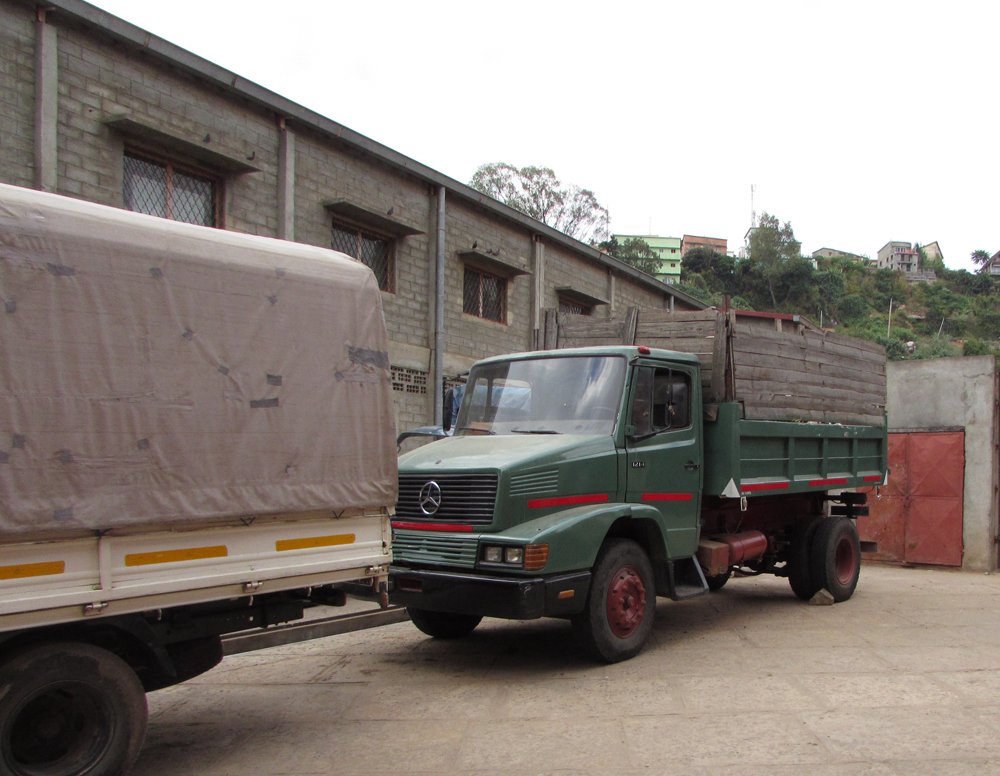cocoa delivery trucks at Robert chocolate factory Madagascar
